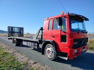 CAMION VOLVO FL6 CON PLATAFORMA