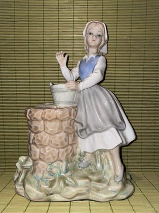 Bonita figura de porcelana