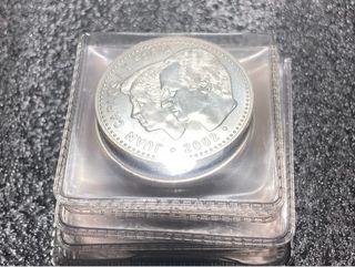 2000 pesetas y 12€ de plata