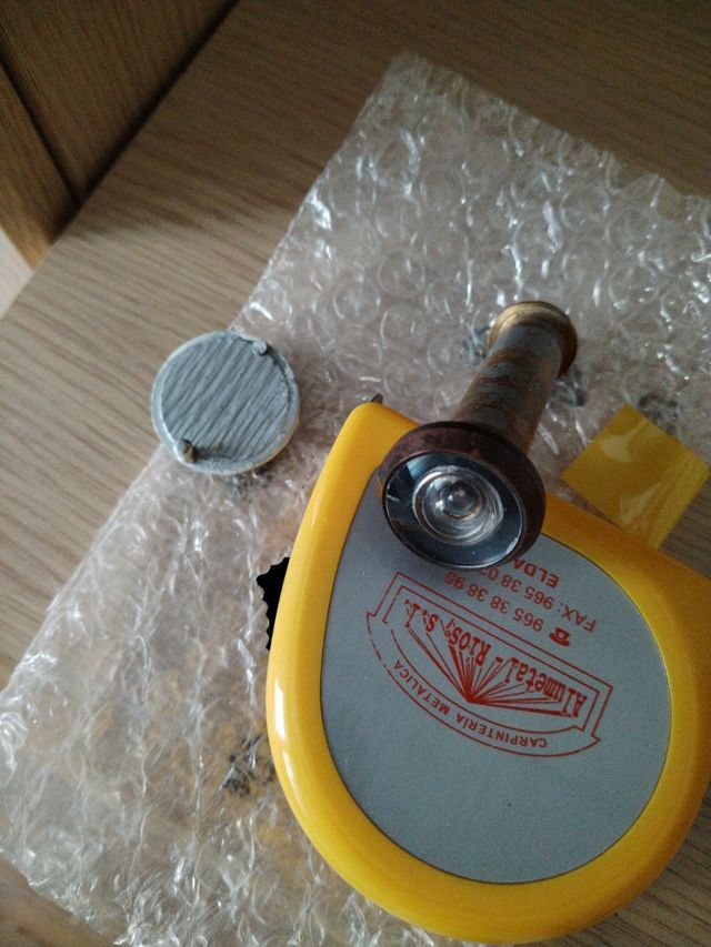 Mirilla para puerta de entrada .