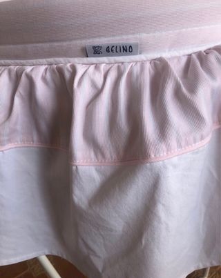 Moises vintage con ruedas en tonos rosas