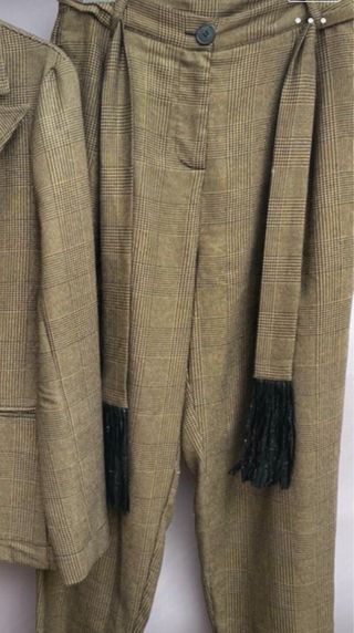 Pantalon twit dorado y negro