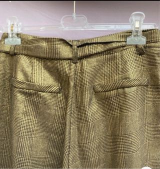 Pantalon twit dorado y negro