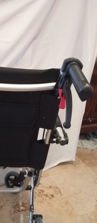Silla de ruedas de viaje.Ahora Descuento