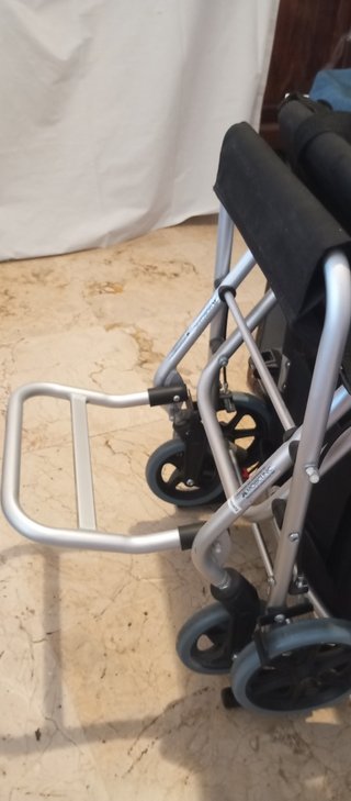 Silla de ruedas de viaje.Ahora Descuento