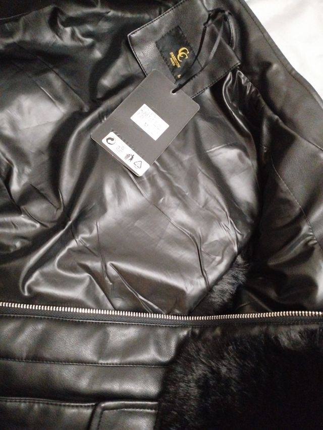 Chaquetón sin mangas pelo y cuero