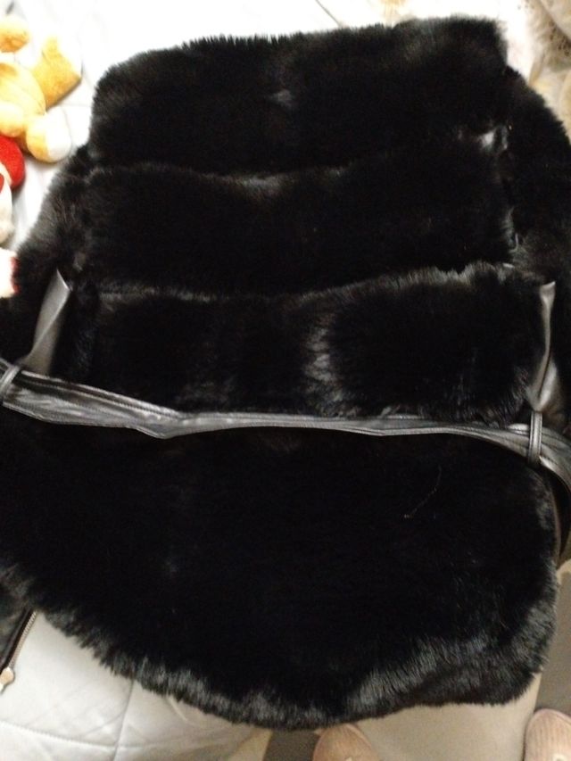 Chaquetón sin mangas pelo y cuero