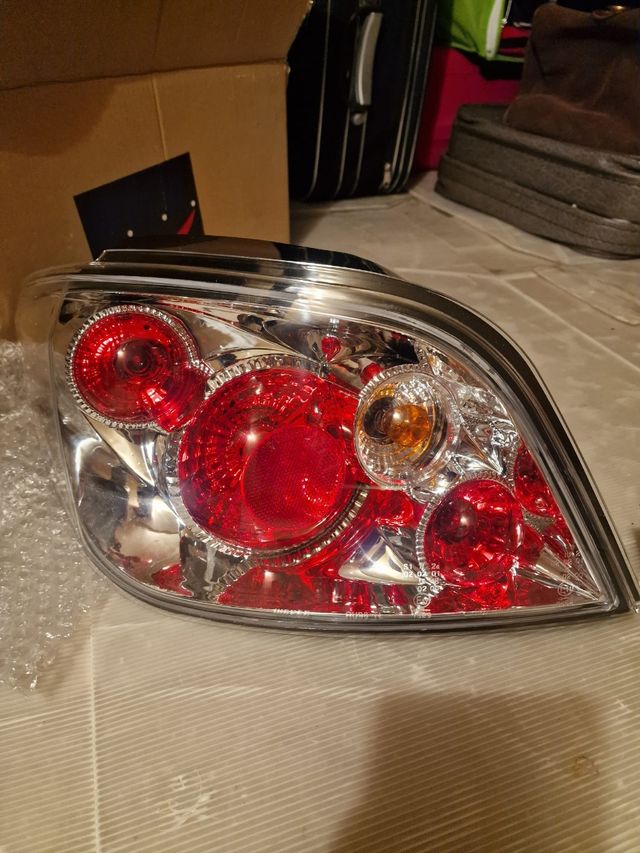 Pilotos traseros 307 tipo lex..us blancos