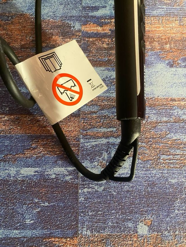 Spazzola lisciante per capelli.