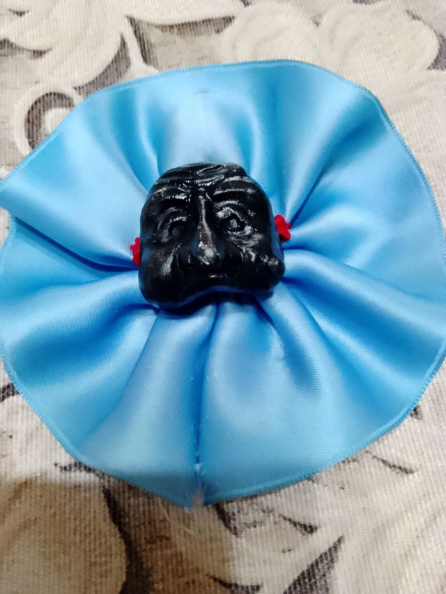 Maschera di pulcinella fatta in pietra