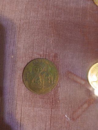 Monete incorniciate,  numismatica