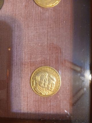 Monete incorniciate,  numismatica