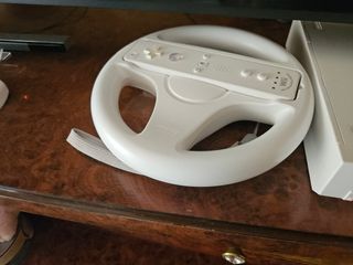 Nintendo wii con giochi 2 comandi e vola