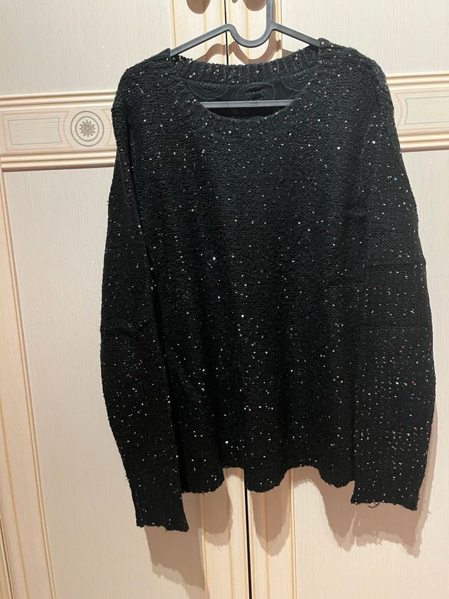 Maglione pailettes con trasparenza