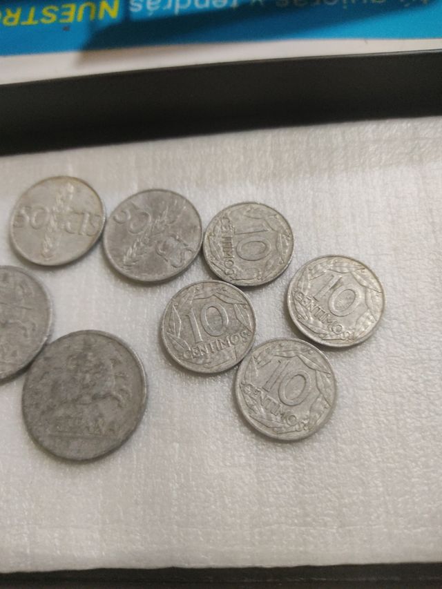 9 monedas Centimos de peseta.años 50.