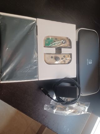 Switch OLED Zelda impecable + funda + caja