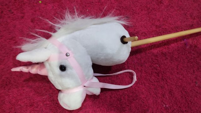 Cabeza de caballo con palo