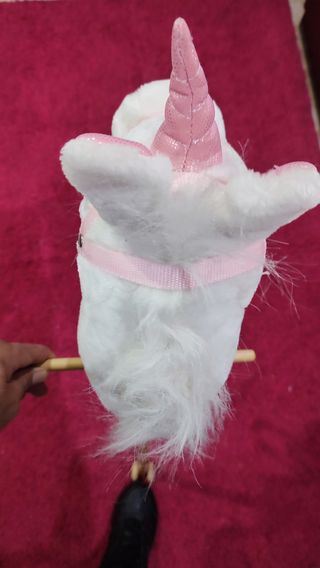 Cabeza de caballo con palo