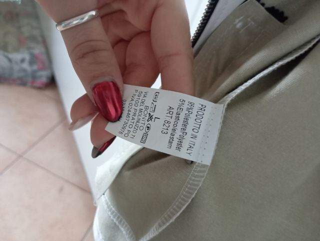 Chiodo bianco in simil pelle