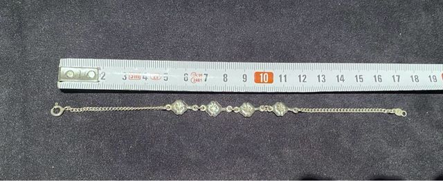 Pulsera cuatro flores plata de ley 