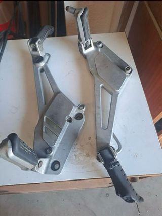 Soporte estribo izquierdo honda cb500