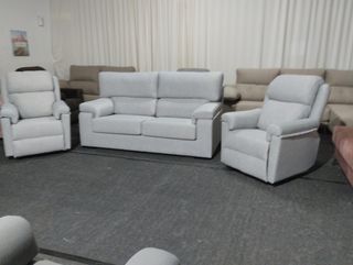 Conjunto sofá y butaca relax nuevo !
