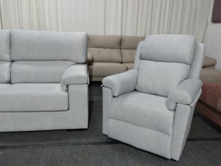 Conjunto sofá y butaca relax nuevo !
