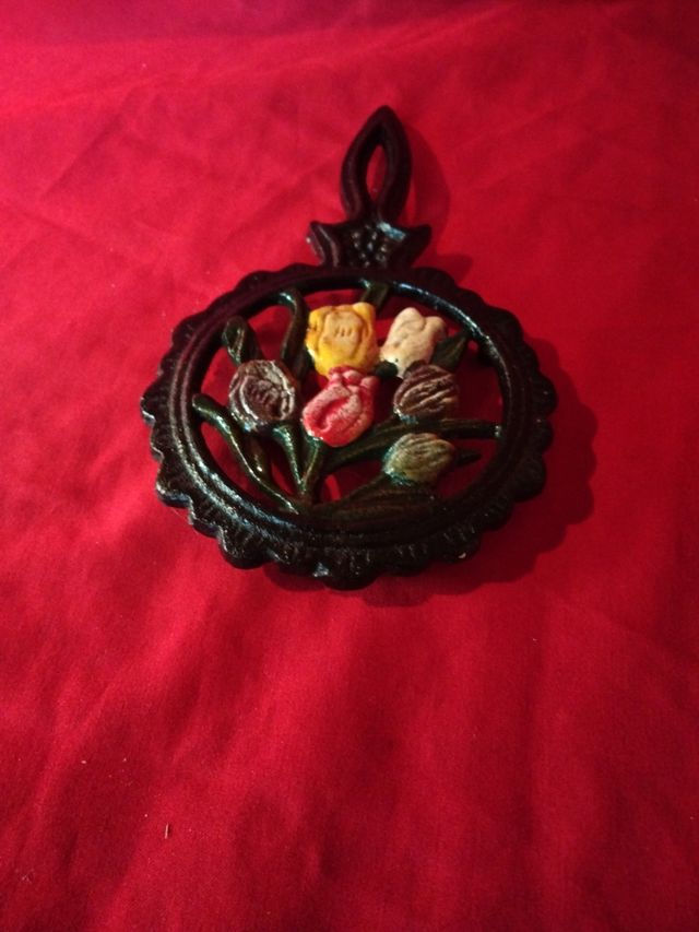 Piccolo poggia tegame in ghisa