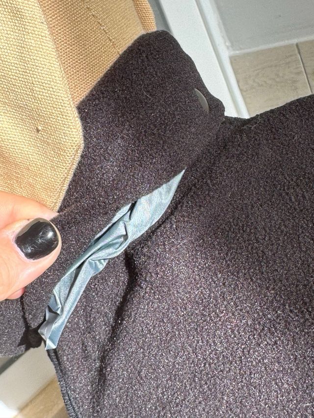 Cappottino in pile con mantella a scomparsa