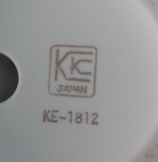 Pareja de figuras de niños de porcelana biscuit