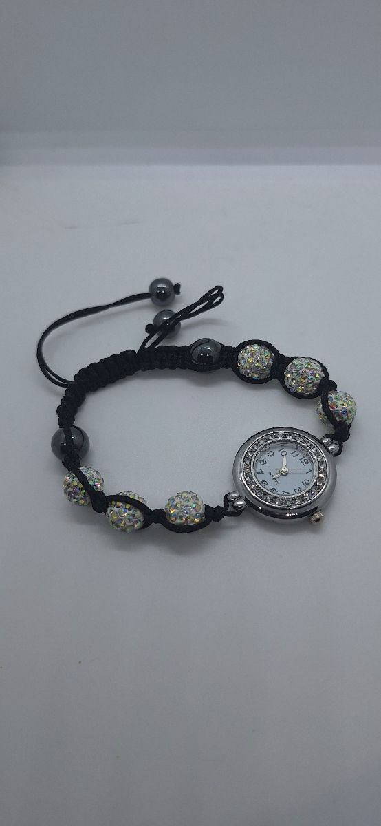 Reloj pulsera tejida
