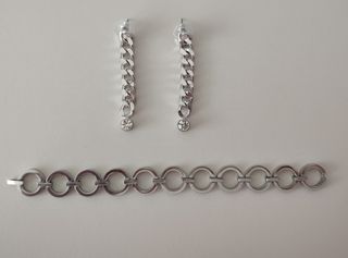 Pulsera y pendientes de acero
