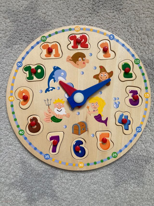 Reloj puzzle de bloques de madera