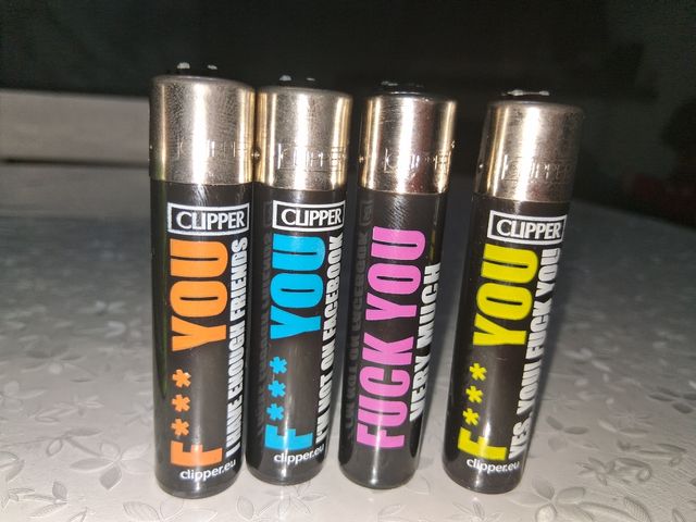 Lotto 12 accendini clipper scheletro oss