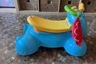 Andador correpasillos fisher price 