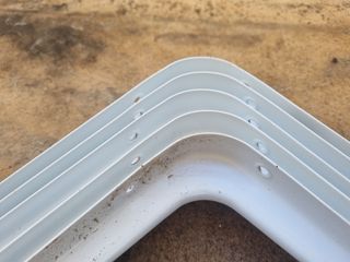 Triángulo y escuadras estantes