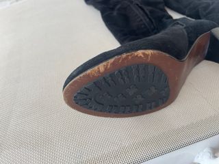Botas altas negras con tachas