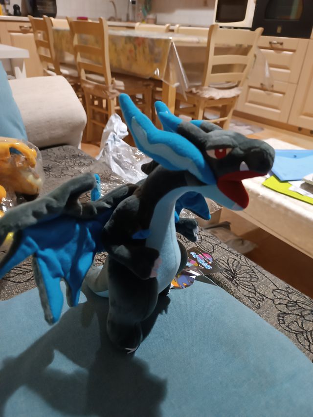 Tris peluche Charizard