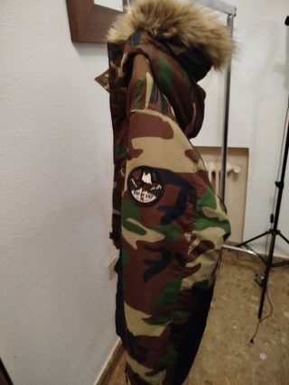 Plumas de zara niño gerra