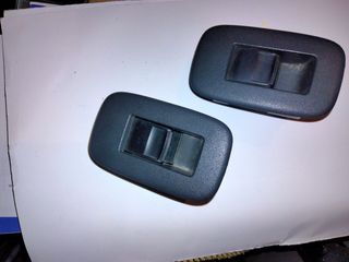 Pulsadores elevalunas traseros Toyota