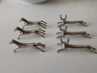 Apoya-cubiertos animales con baño de plata.