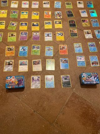  cartas pokemon y 2 cajas