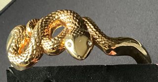 Un bracciale a forma di serpente Donna, colore oro