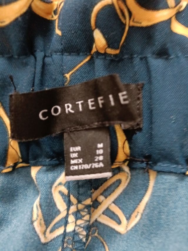 Conjunto pantalón y blusa