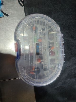 Caja de accesorios para lijadora eléctrica