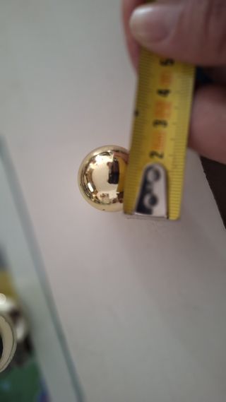 Pomo armario bola dorado