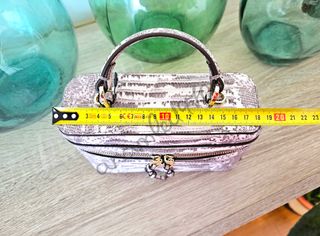 Bolso rígido animal print zara