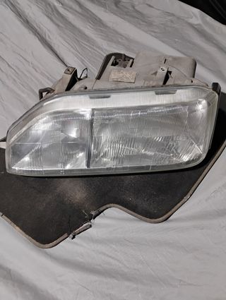 Piloto  original , delantero izquierdo r 25 V6 tur