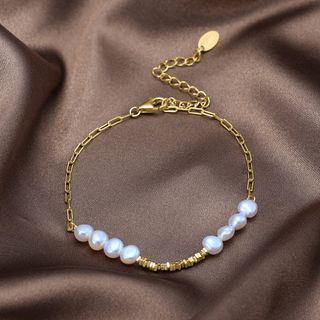 Pulsera dorada de plata 925 con perlas naturales.
