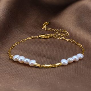Pulsera dorada de plata 925 con perlas naturales.